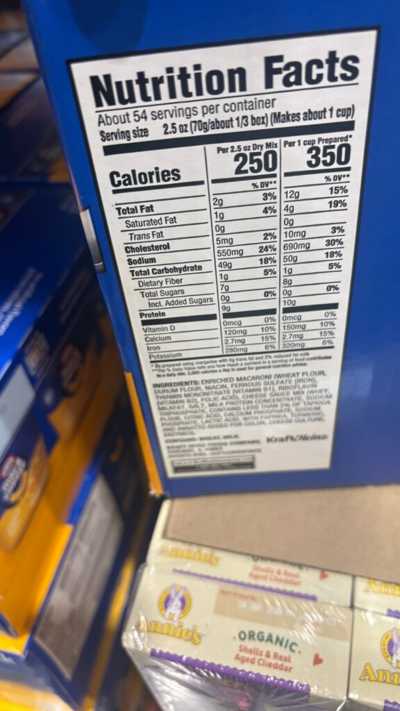 Nutrition label on Kraft Mac & Cheese showing 350 calories per prepared cup, 9g protein, 4g total fat, and 50g carbs. The label also shows a sodium value of 690mg and no added sugars.